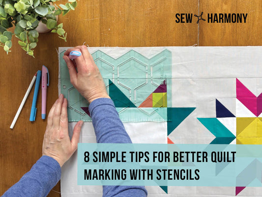 Acrylic hexiepop stencil being used to mark a quilt top using water soluble pens.